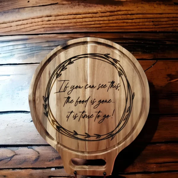 A wooden tray with a quote on it.